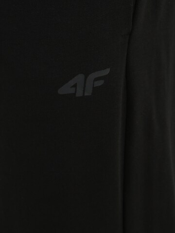 Effilé Pantalon de sport 4F en noir