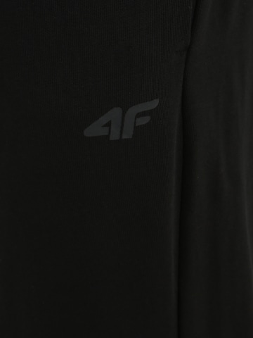 Effilé Pantalon de sport 4F en noir