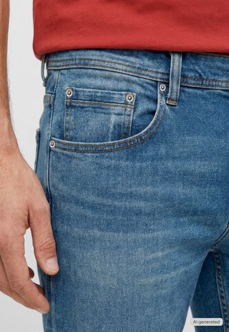 MUSTANG Tapered Jeans in Blue