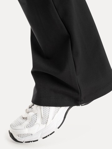 évasé Leggings ' Florea ' Smilodox en noir