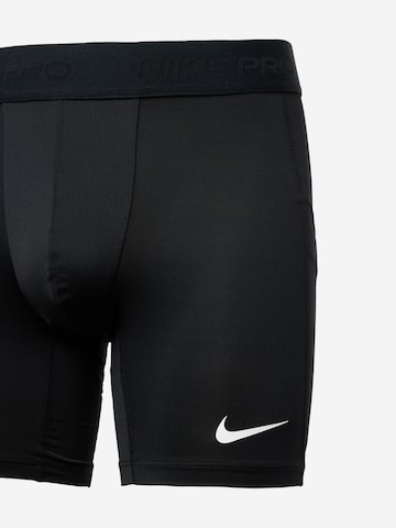 NIKE Skinny Sporthose in Schwarz