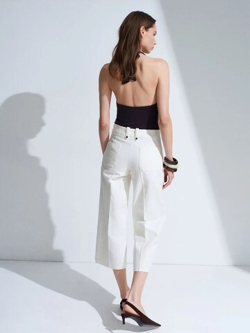 Wide leg Pantaloni di Dilvin in bianco