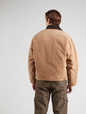 Carhartt WIP Välikausitakki 'Detroit' värissä ruskea