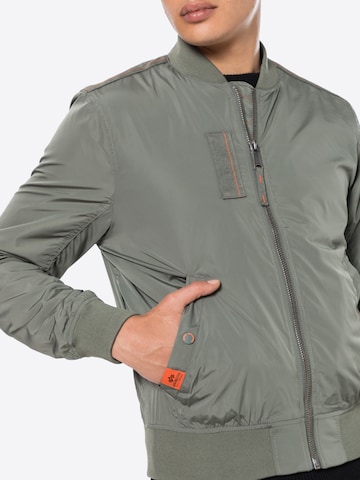 ALPHA INDUSTRIES Between-Season Jacket 'MA-1 Parachute' in Green