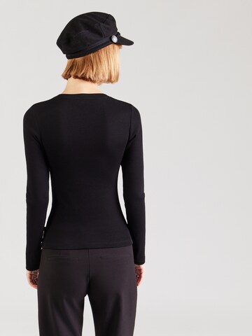 Maglietta di GUESS JEANS in nero