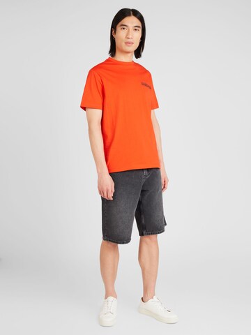 NAPAPIJRI - Camiseta 'GOUIN' en naranja