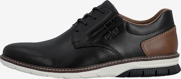 Chaussure basse 'Sneaker aus Clarino-Leder' Rieker en noir : devant