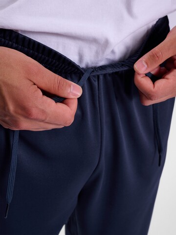 Hummel Slimfit Sportsbukser i blå