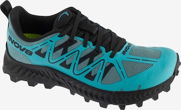 Chaussure de course Inov-8 en bleu : devant