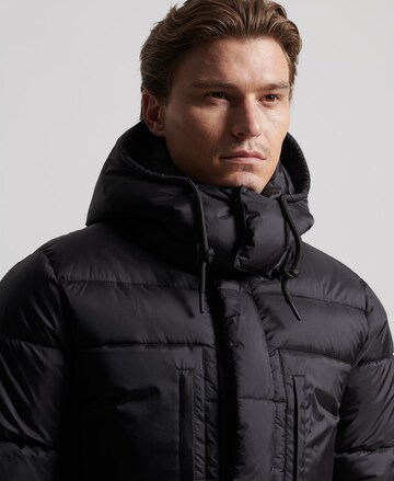 Manteau d’hiver 'Touchline' Superdry en noir