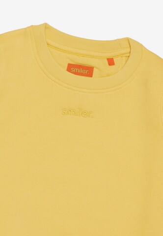 Sweat smiler. en jaune