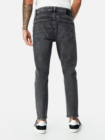 Mavi Tapered Jeans in Schwarz