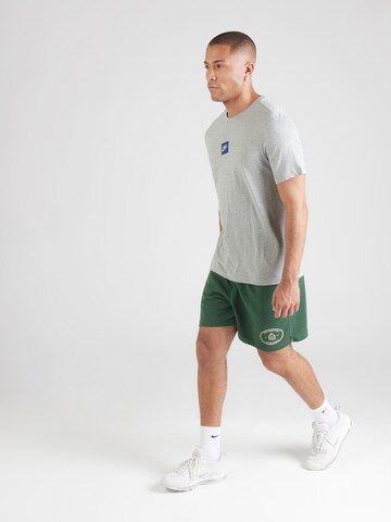 T-Shirt fonctionnel Nike Sportswear en gris