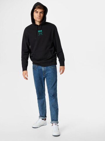 LEVI'S ® Средняя посадка Свитшот 'Relaxed Graphic Hoodie' в Черный