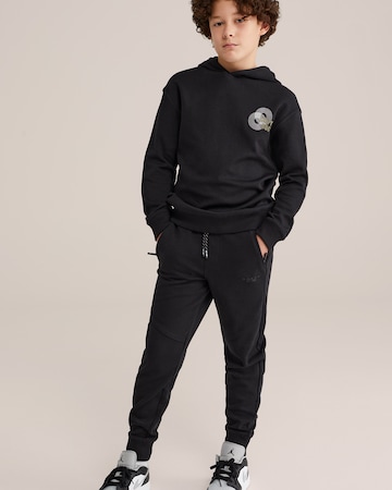 WE Fashion Tapered Hose in Schwarz: Vorderseite
