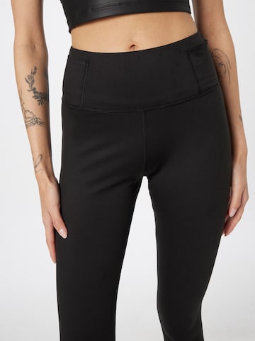 PUMA Skinny Sportbroek in Zwart