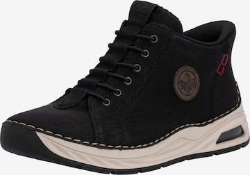Rieker Slip-Ons in Black: front