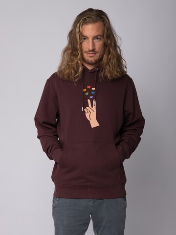 Felpa ' Spread Love ' di Watapparel in rosso: frontale