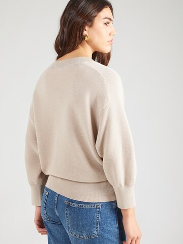 bēšs monari Džemperis