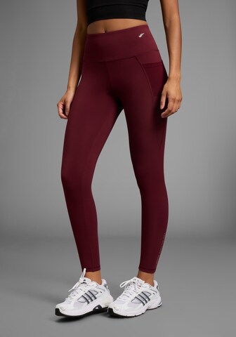 FAYN SPORTS Slim fit Workout Pants in Red: front
