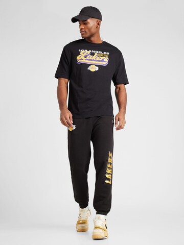 Tapered Pantaloni 'NBA TEAM' di NEW ERA in nero