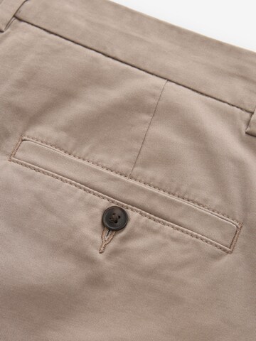 Next Slimfit Chinobyxa i beige