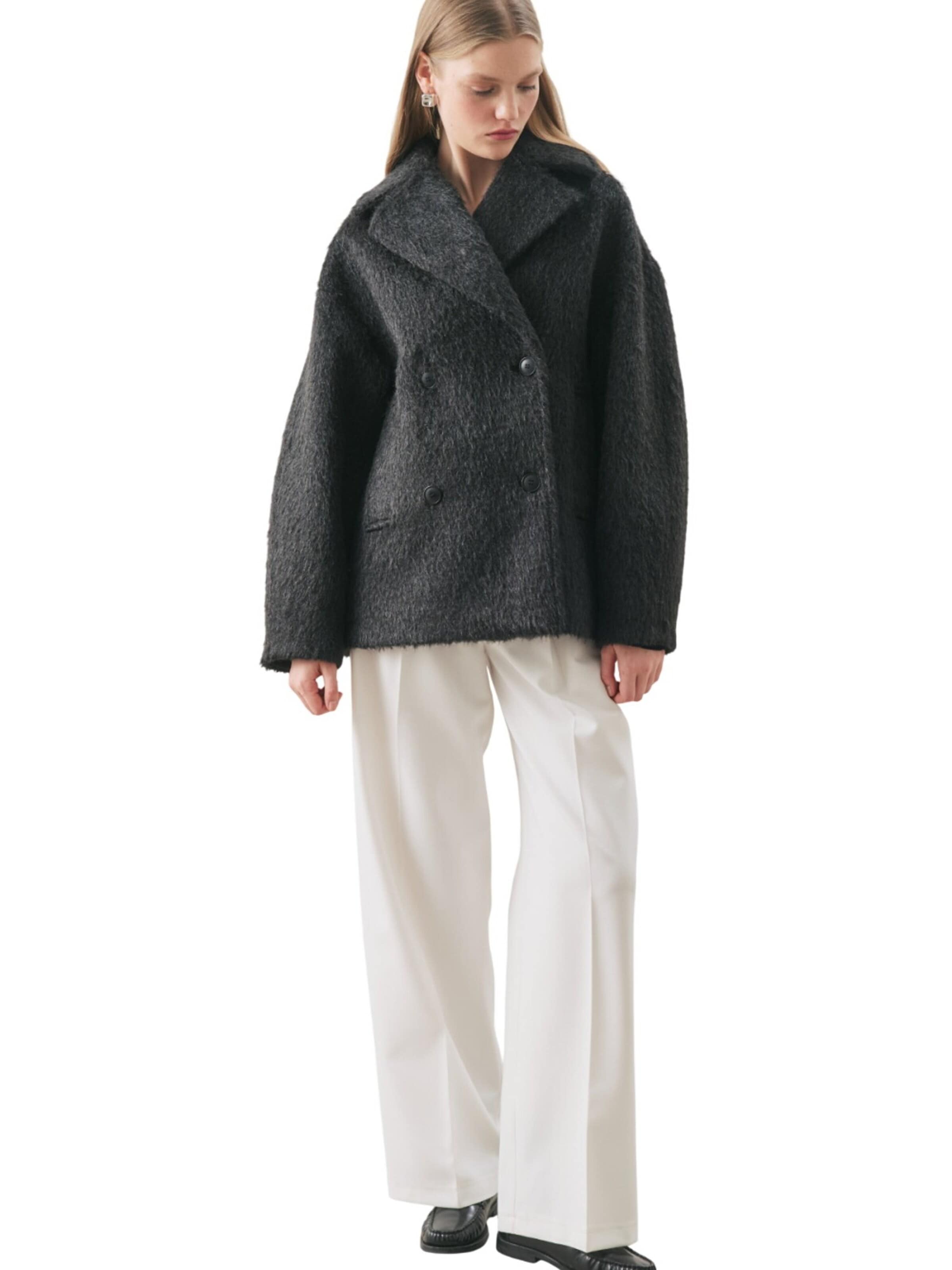 MANUKA Winterjacke‌‌‌‌‌‌‌‌‌‌ in S-M in schwarz, Produktansicht