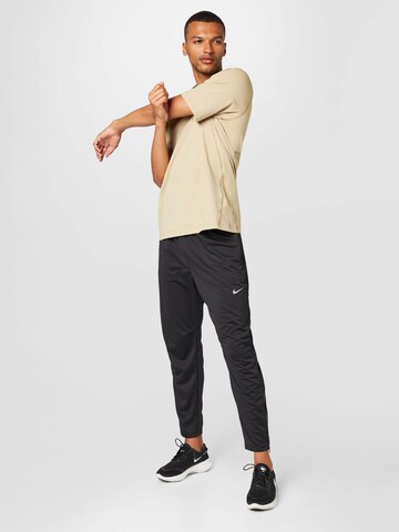 T-Shirt fonctionnel 'Axis' NIKE en beige