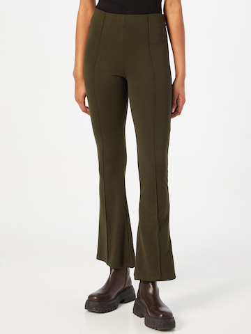 Trendyol Flared Pants in Green: front