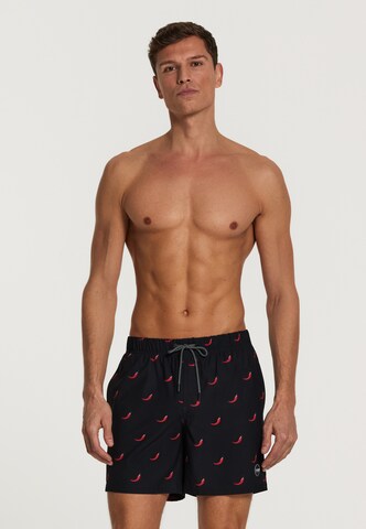 Shiwi - Bermudas 'chili pepper 4-way stretch' en negro: frente