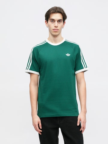 ADIDAS ORIGINALS - Camiseta en verde: frente