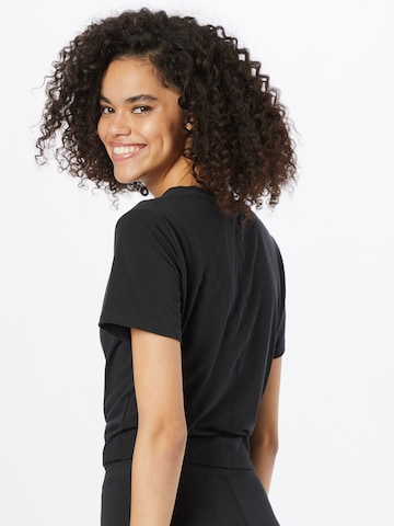 NIKE Functioneel shirt 'One Luxe' in Zwart