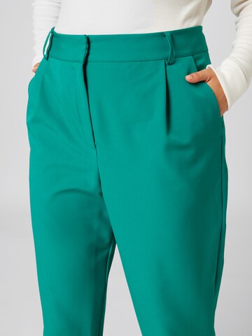 Guido Maria Kretschmer Curvy Tapered Pleat-Front Pants 'Inka' in Green