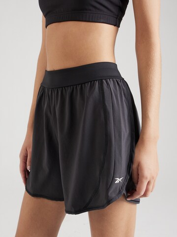 Regular Pantaloni sport 'LUX' de la Reebok pe negru