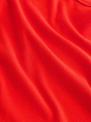 Top de la Next pe roșu