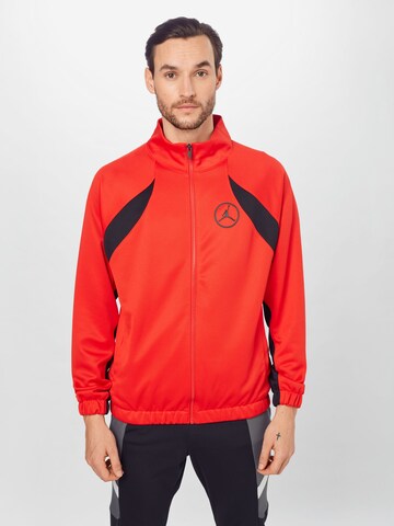 Veste de sport Jordan en rouge : devant