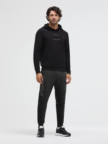 CAMP DAVID Tapered Pants in Black