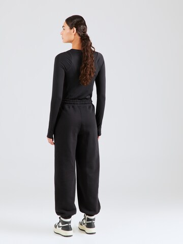 Jordan Tapered Trousers in Black