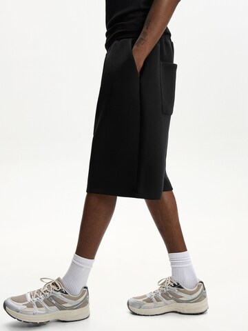 Wide leg Pantaloni di Bershka in nero