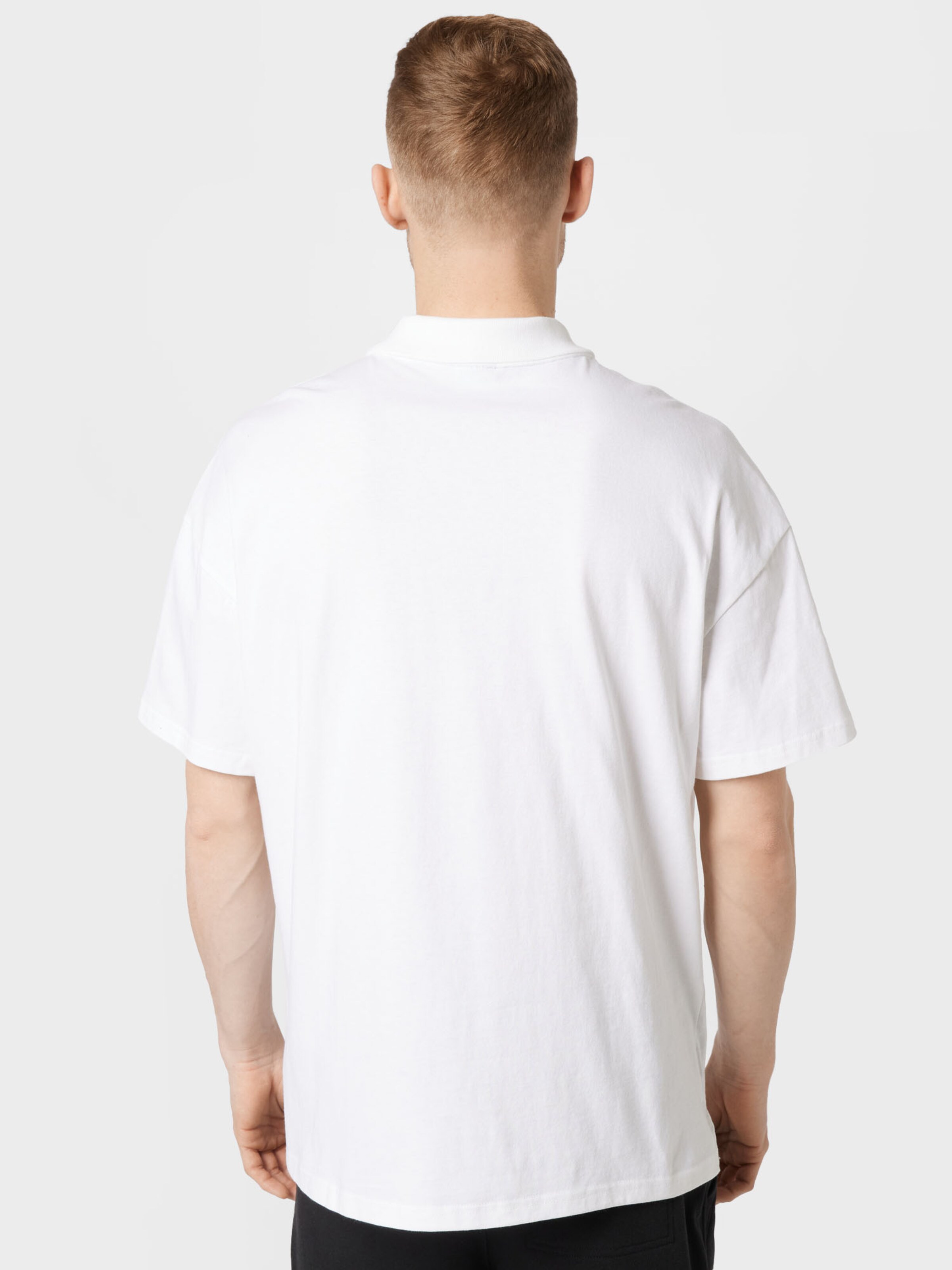 PUMA Camiseta en Blanco | ABOUT YOU