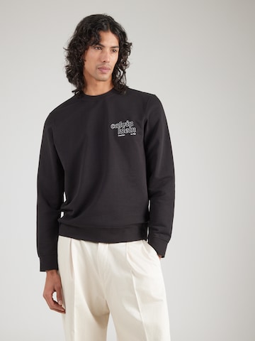 Calvin Klein JeansSweater majica - crna boja: prednji dio