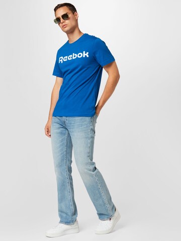 Reebok - Camisa funcionais em azul