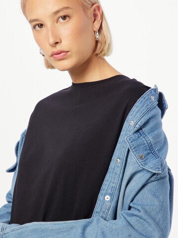 UNITED COLORS OF BENETTON T-Shirt in Schwarz