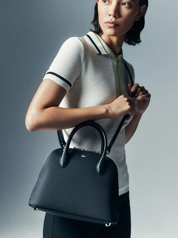 LACOSTE Handtas 'Lacoste Sac à main Daily City Noir' in Zwart