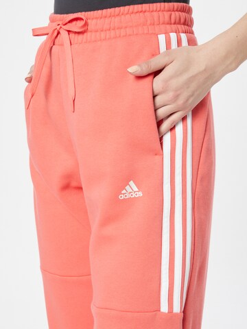 ADIDAS SPORTSWEAR Tapered Workout Pants in Red