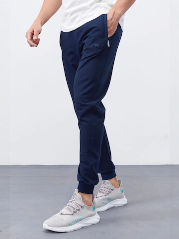 Tommy Life - Skinny Calças de desporto 'Jogginghose' em azul