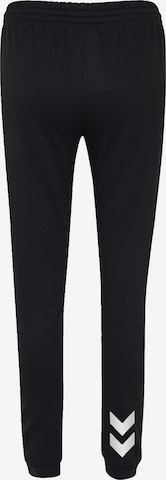 Hummel Zwężany krój Spodnie sportowe w kolorze czarny