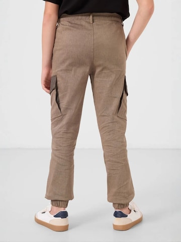 Pantalon 'TOMMY Kinder Cargo-Joggerhose' Tommy Life en marron