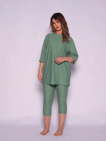 MYKINY BRAND High neck Swimsuit 'Majda semi-burkini Pistache Green' in Green