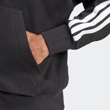 Veste de survêtement ADIDAS SPORTSWEAR en noir